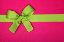 bigstock-Present-with-green-ribbon- bow-lrg-44700430.jpg
